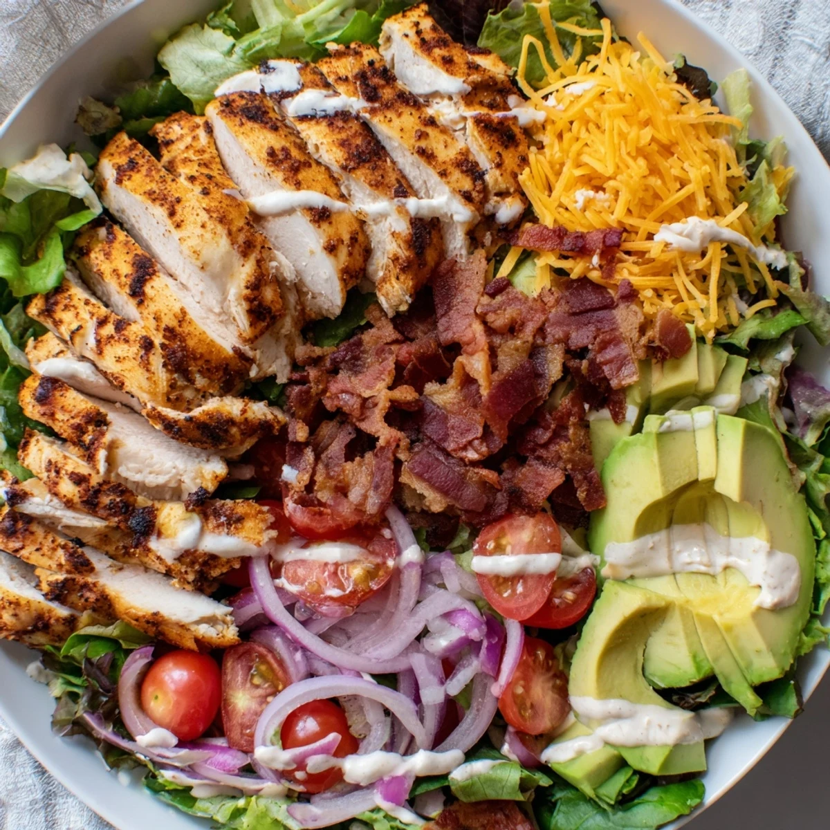 Delectable crispy bacon chicken salad, a flavorful combination of chicken and bacon with a creamy dressing.