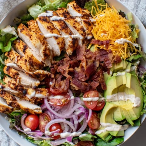 Delectable crispy bacon chicken salad, a flavorful combination of chicken and bacon with a creamy dressing.