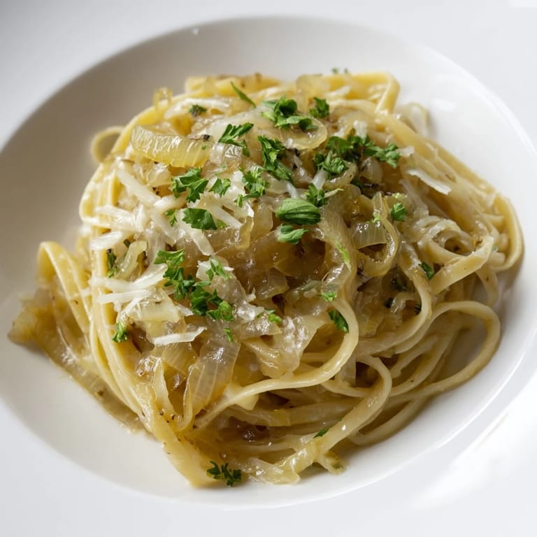 Creamy and cheesy one-pot French onion pasta, a comforting vegetarian main course delight.